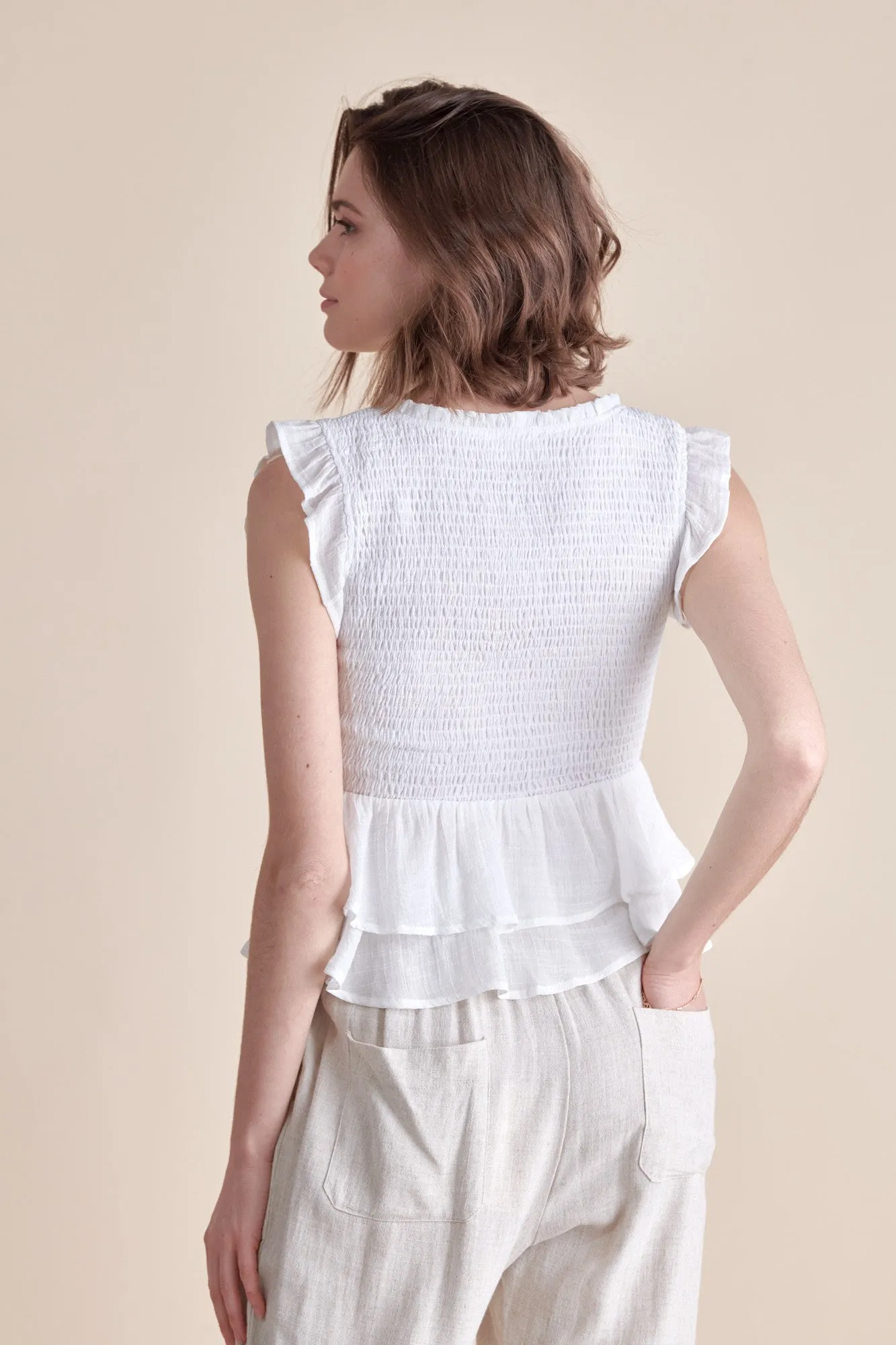 The Smocked Lace-up Top with Ruffle Detail in White